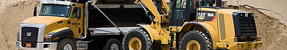 KÖZEPES MÉRETŰ GUMIKEREKES HOMLOKRAKODÓ